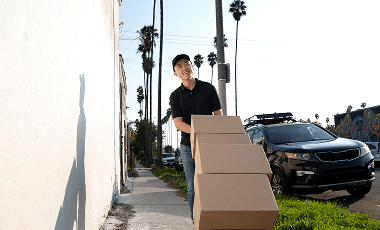 delivery-person-getting-parcel-out-delivery 1 (3)