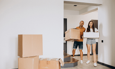 young-family-moving-into-their-new-house 2